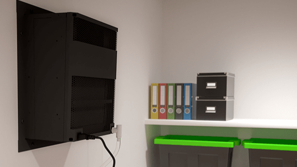 Black wall-mounted TV with a shelf below containing colorful binders and a black drawer.