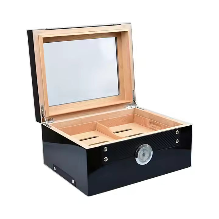 Cigar humidor with black exterior and wooden interior on a white background