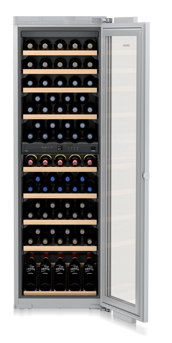 Wine cooler with bottles of wine on shelves