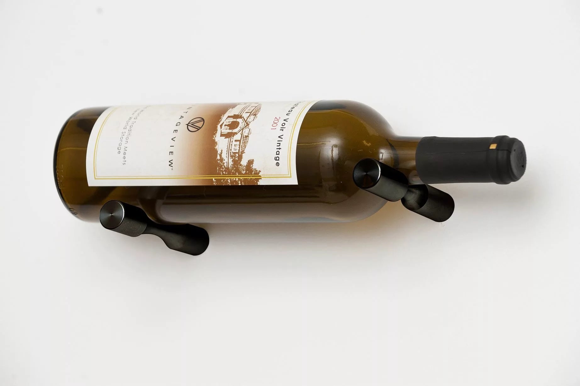 Wine bottle with a holder on a white background