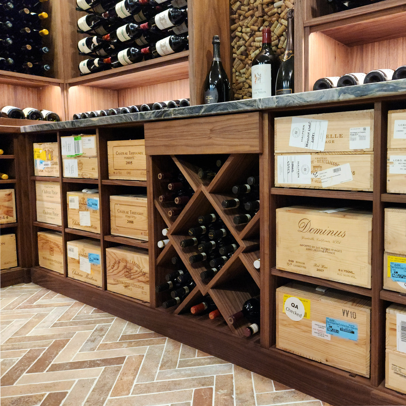 Wooden wine rack with wine bottles and wine stoppers