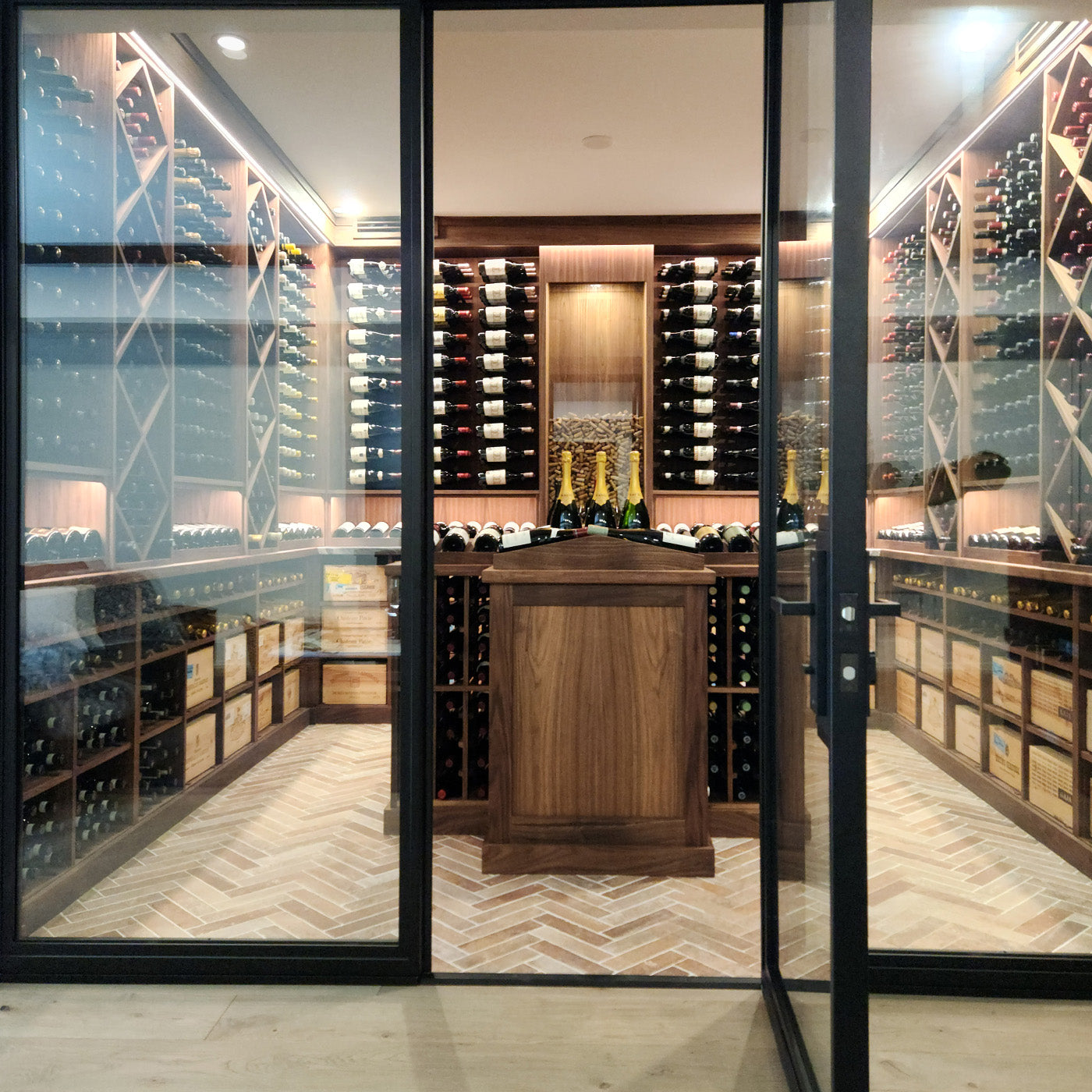 Wooden wine rack with wine bottles and wine stoppers