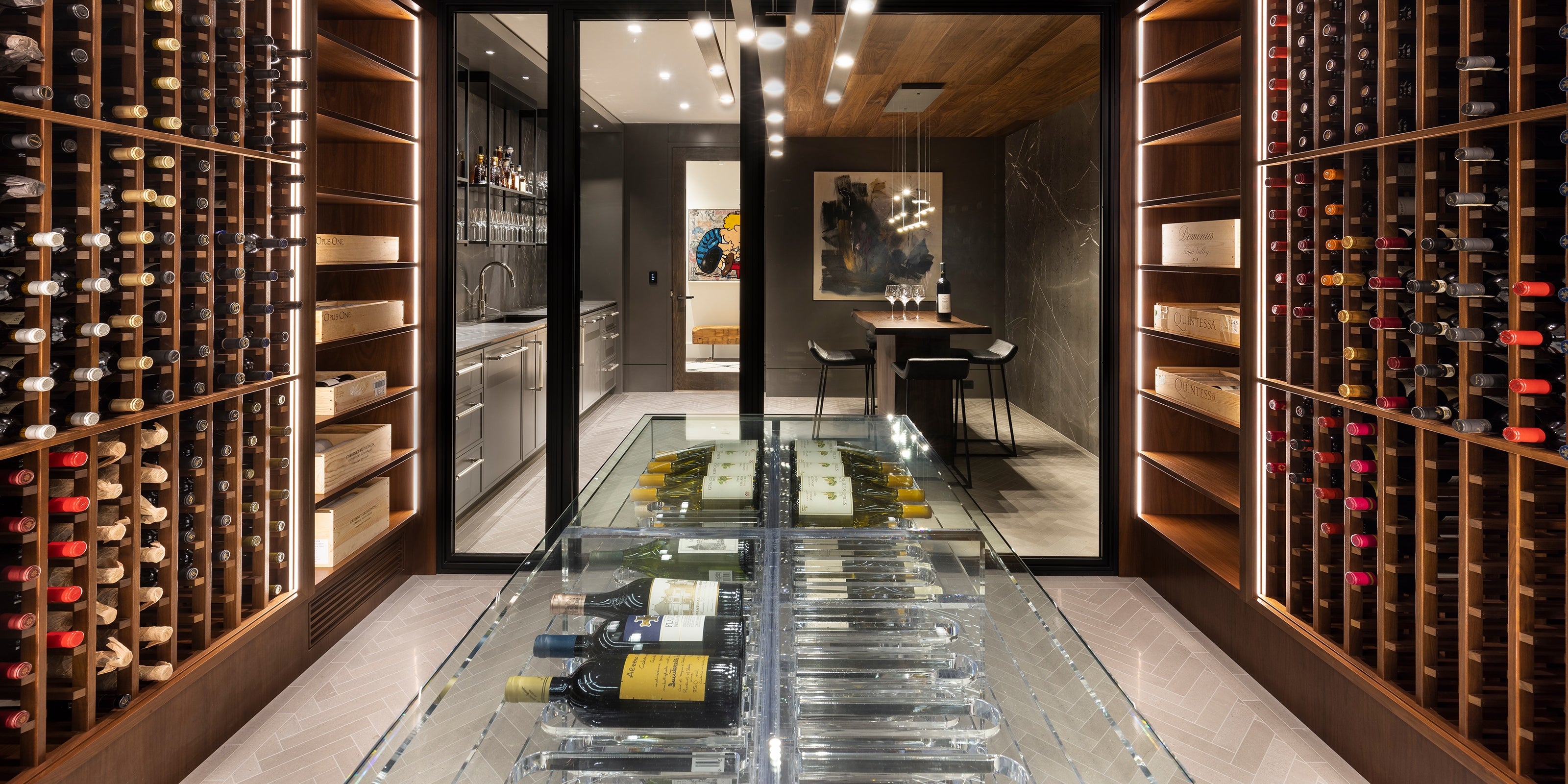 Wine cellar with wooden wine rack and wine bottles.