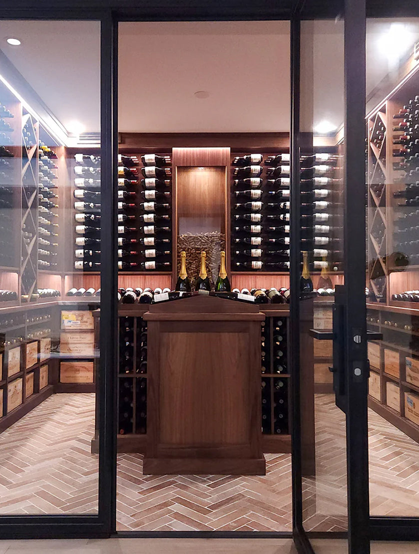 laxury room filled with multiple wine rack shelves holding wine bottles.