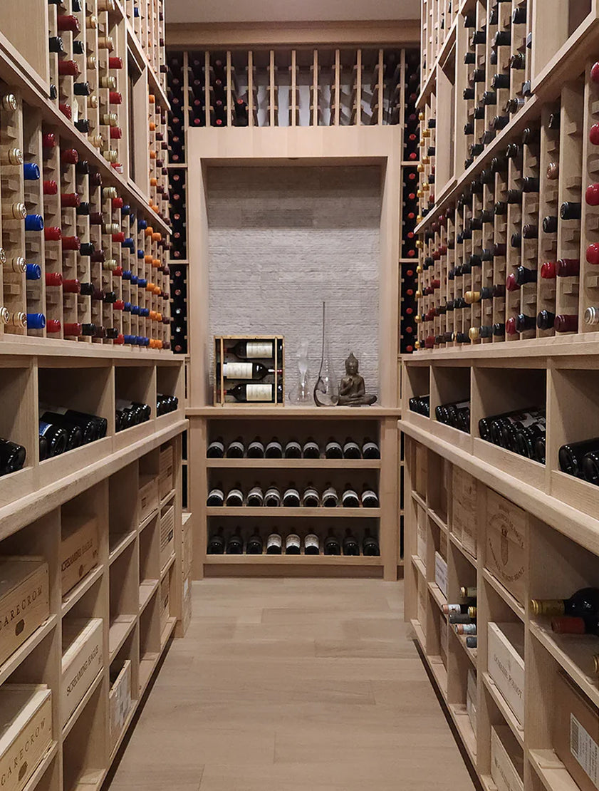 laxury room filled with multiple wine rack shelves holding wine bottles and wine galss.