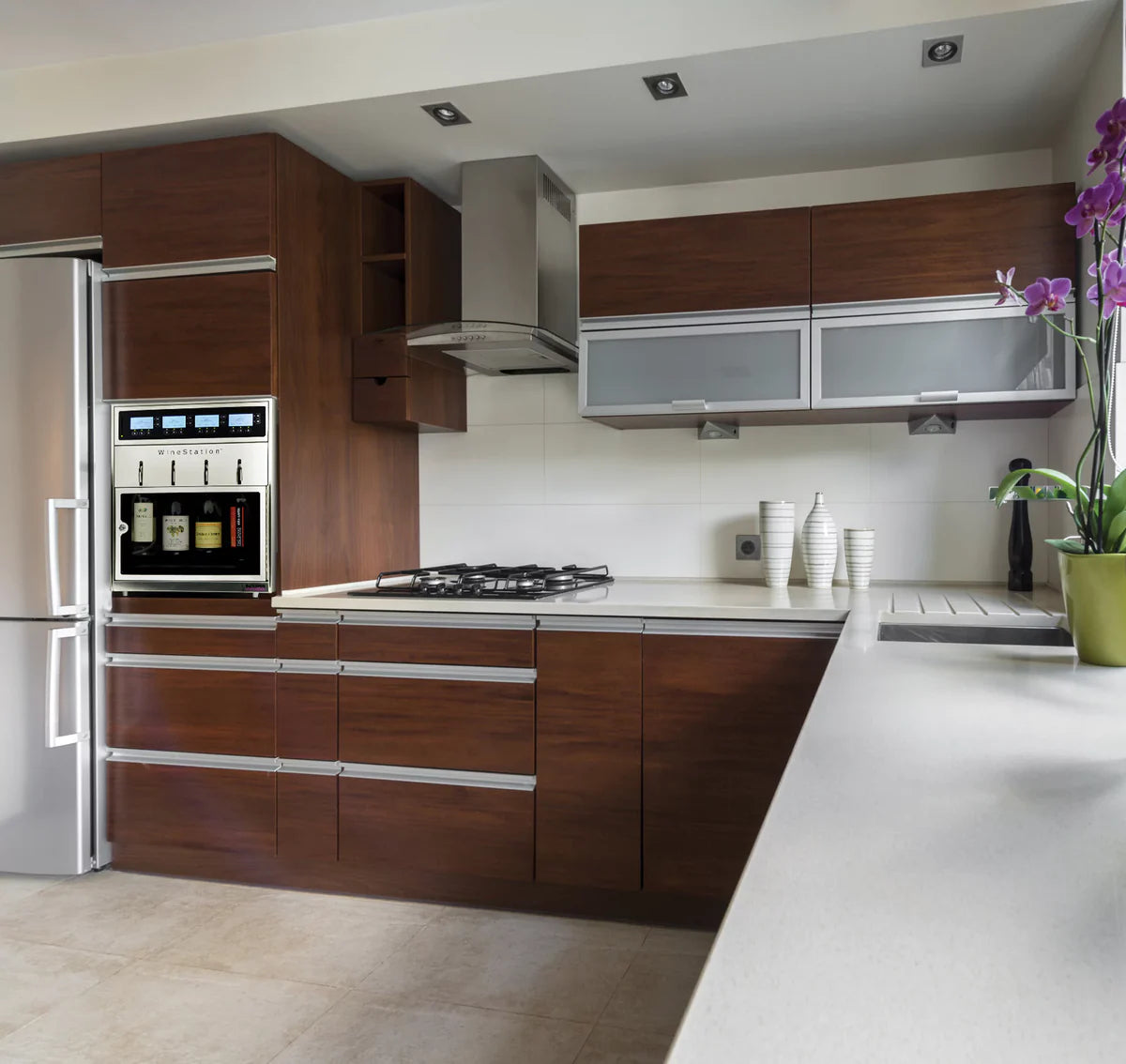Modern kitchen with wooden cabinets, stainless steel appliances, and white countertops.