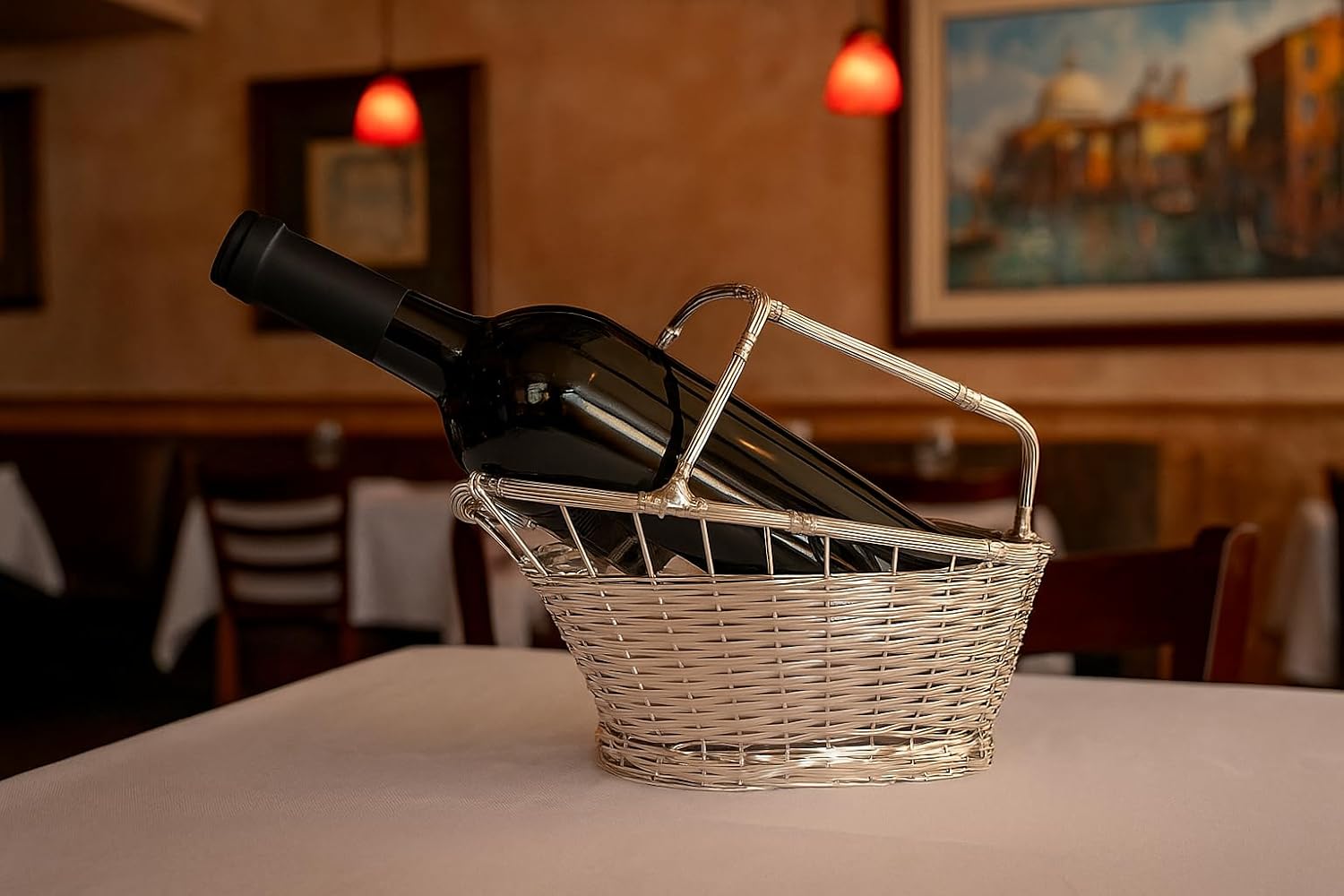 Wicker basket with a bottle of wine on a table in a restaurant setting