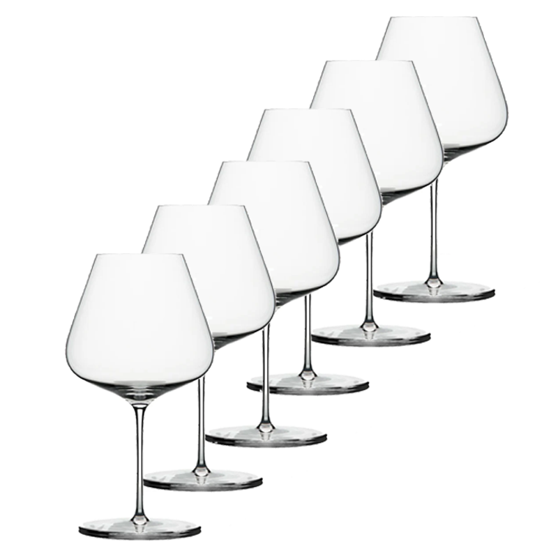 Set of six clear wine glasses on a white background