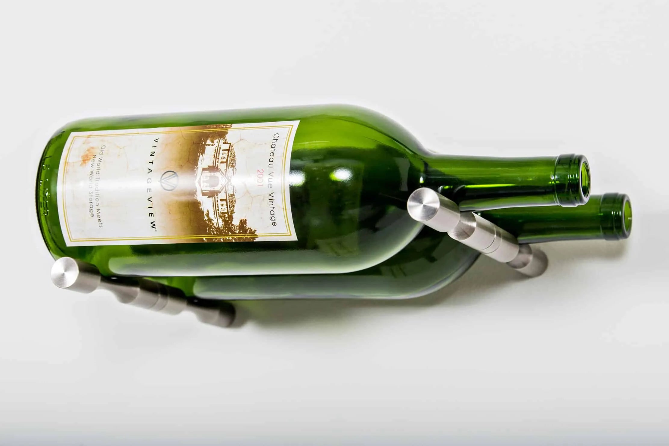 Green wine bottle with a label on a white background