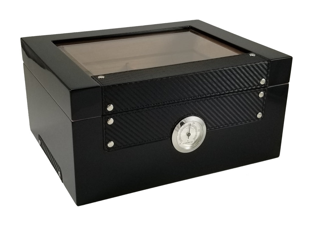 Black carbon fiber patterned humidor with glass top on a white background